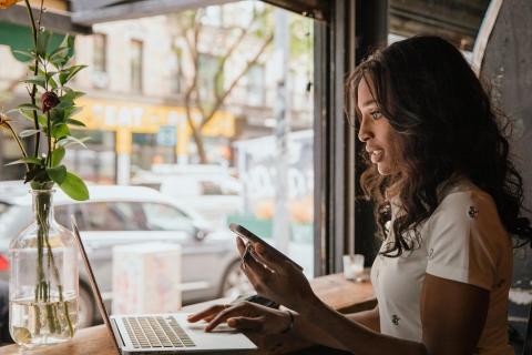 Woman on phone and computer